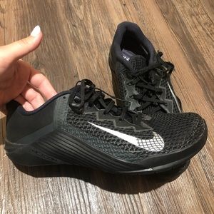 Black Nike running shoes